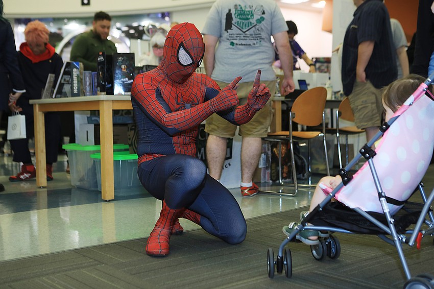 Michael Pelaez as Spider-Man surprises Athena Crider