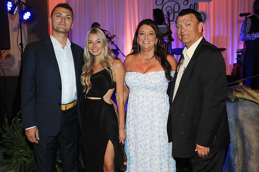 Daniel Budslick and Elma Pandza with Lisa and John Budslick