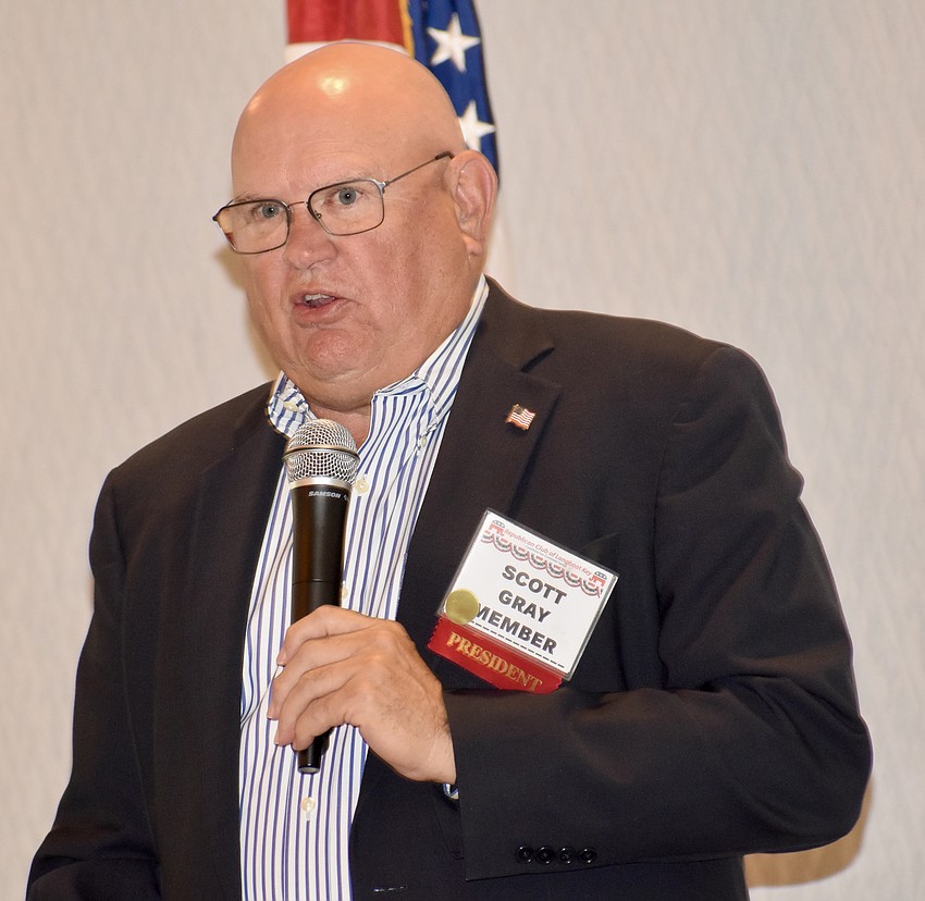 Club President Scott Gray introduces the evening's speakers.
