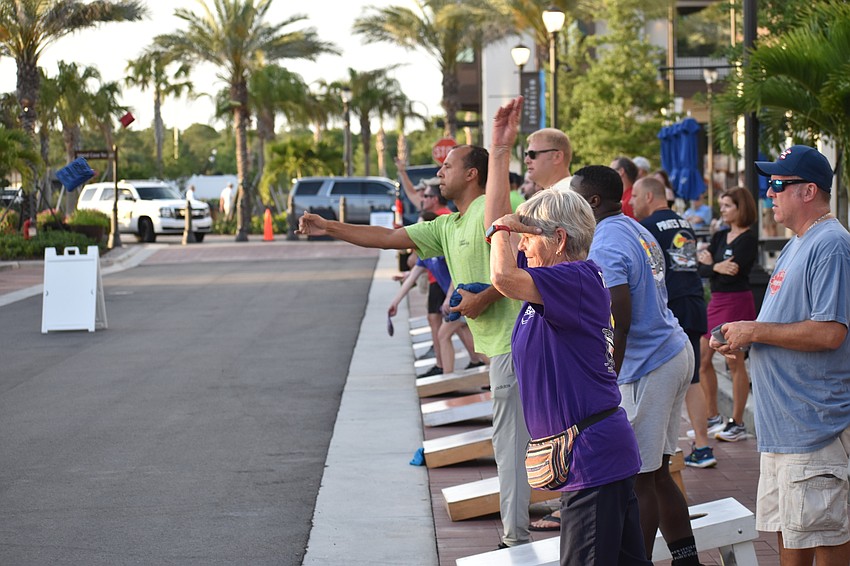 The MVP cornhole league fills one of the streets throughout the evening.