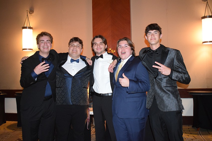 Juniors Bryce Elder and Mason Johnson, senior Connor Rice and juniors Colin Barrett and Will King arrive in style.