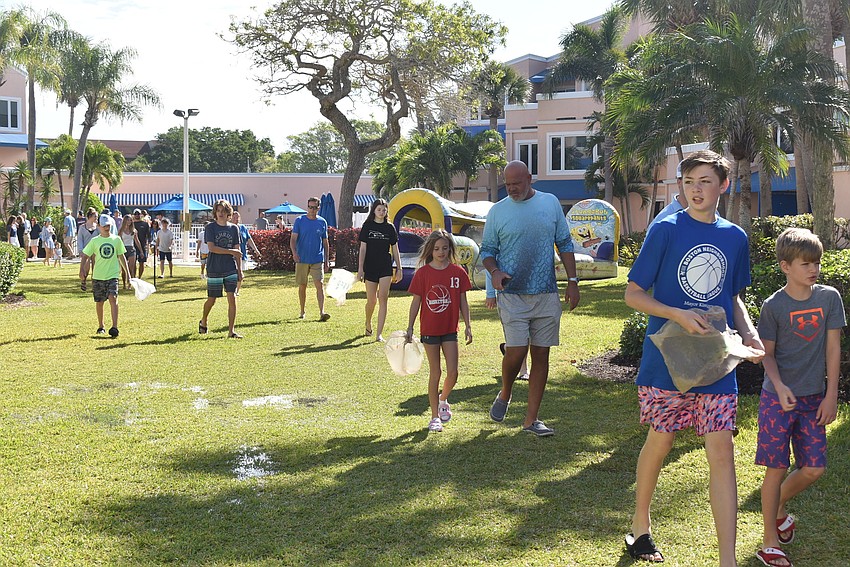 Kids head out to hunt for eggs.