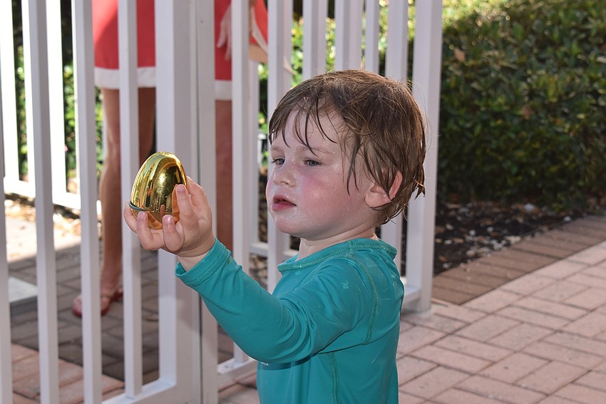 Reef Keating shows off his golden egg.