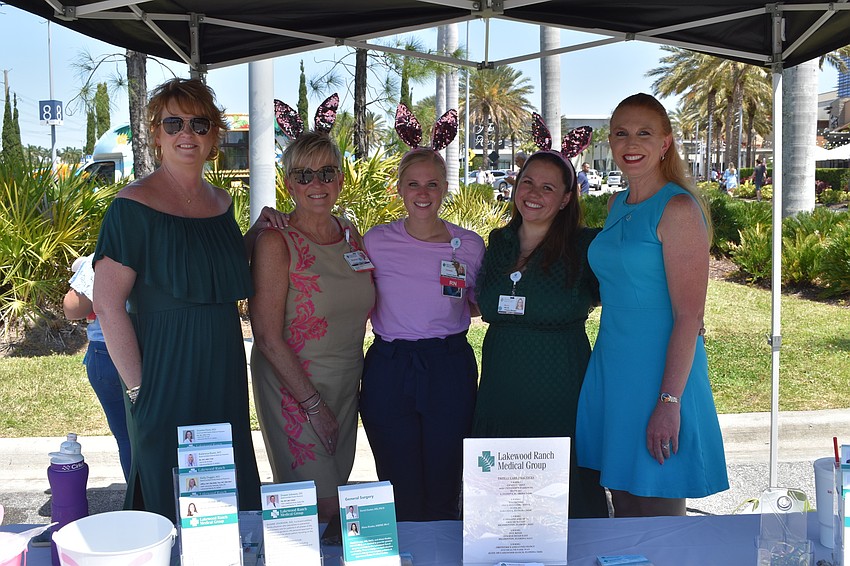Kathleen Cucci, Shannon Barnes, Christie Caballaro, Maria Patino, and Angie Scarpa represent Lakewood Ranch Medical Group, a sponsor of the event.