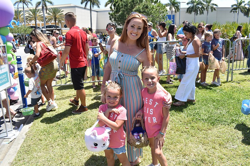 Lakewood Ranch's Bridget Gronick and her daughters, 5-year-old Brynn Gronock and 6-year-old Madison Gronock enjoy the festivities.