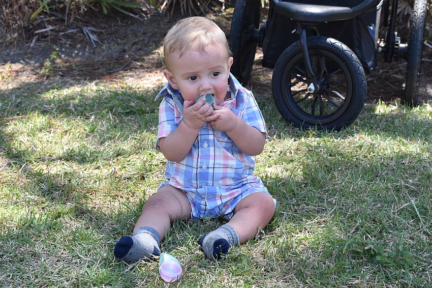 Axel Clark, the 8-month-old son of Lauren Clark, might not be old enough for the egg hunts but he still enjoyed what his older siblings had found.