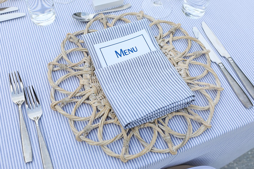 The evening's dinner had a blue color scheme in honor of the ambassadors.