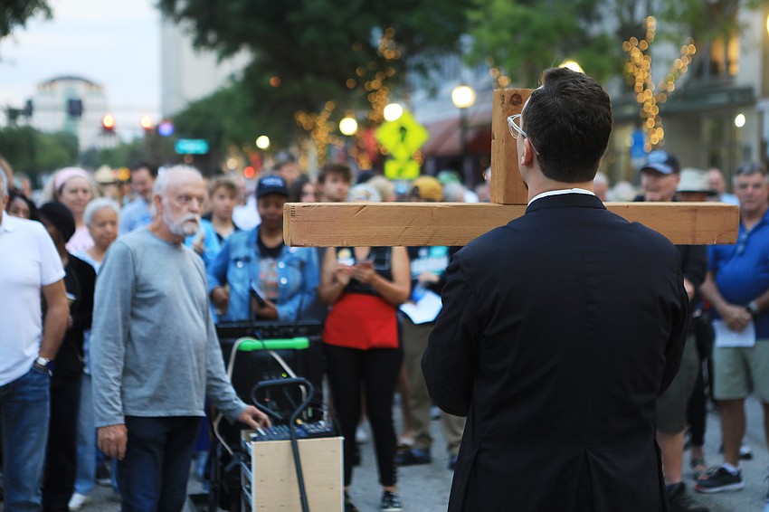Father David Svihel with the Church of the Redeemer leads the walk.