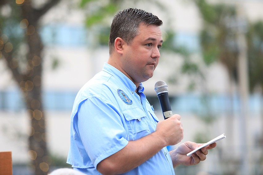 Christian Ziegler speaks at an early station.