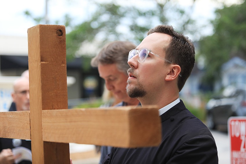 Father David Svihel with the Church of the Redeemer leads the walk.