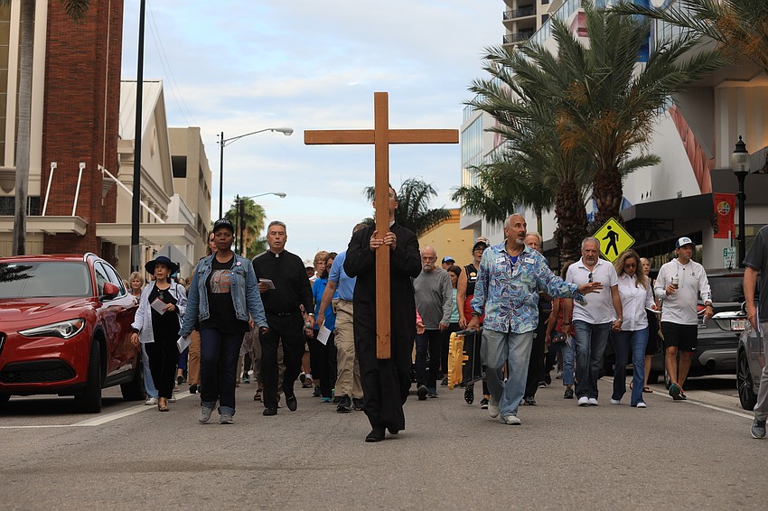Father David Svihel with the Church of the Redeemer leads the walk.