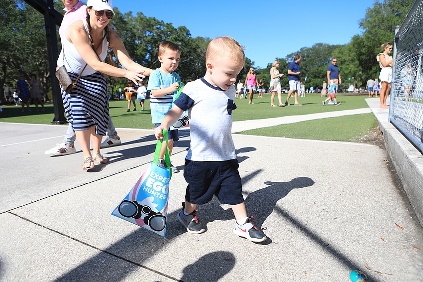 Brett Coppens searches for eggs.