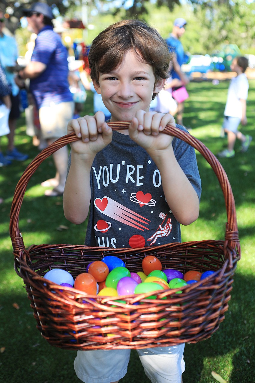 Benjamin Simms gathers 64 eggs.