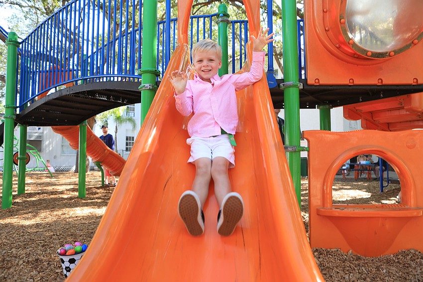 Tucker Peters slides down.