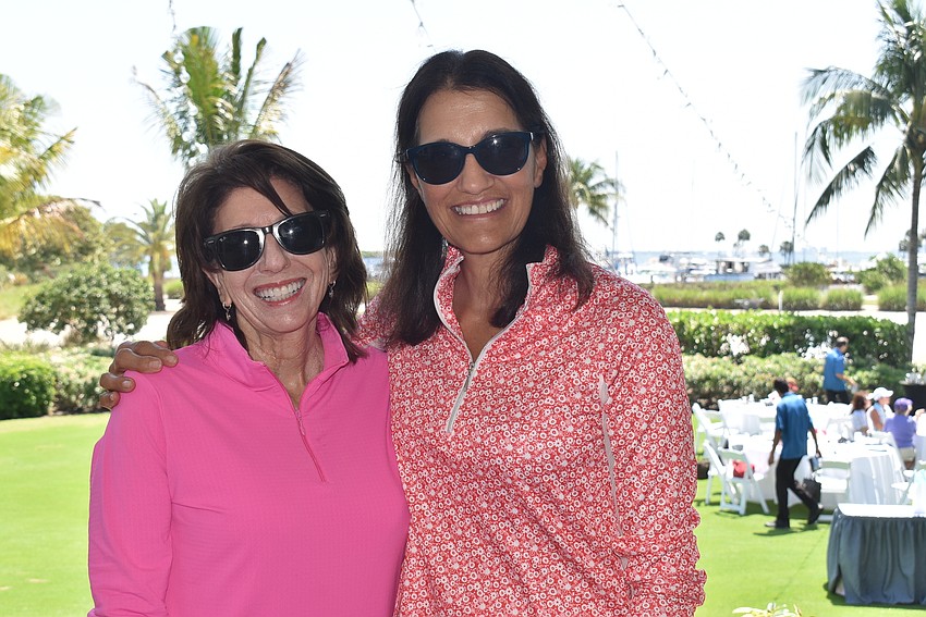 Lori Brochin and Pam Crowe stayed out of the bright sun just a bit longer.