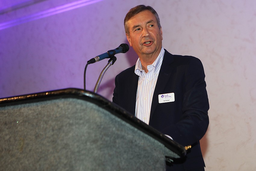 Board chair Ed Scharf