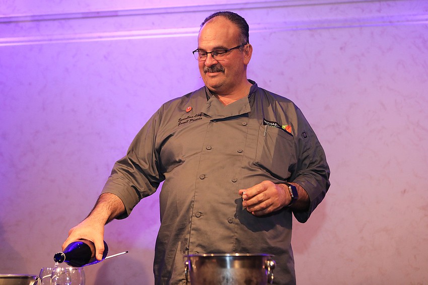 Chef Jamil Pineda prepares the food.