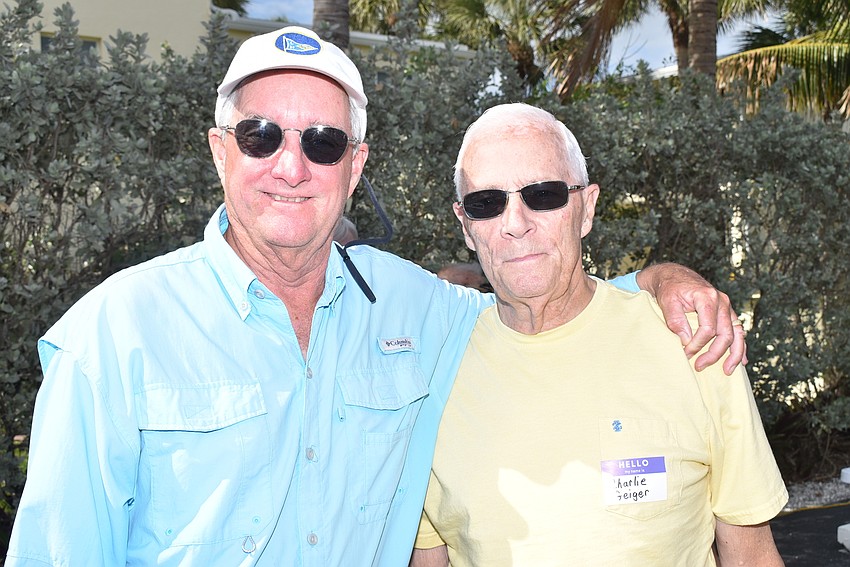 John Macumber and Charlie Geiger caught up at the party.