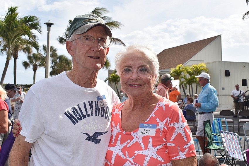 Phil and Susan Martin wait for pizza.