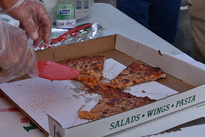Volunteers served up slices.