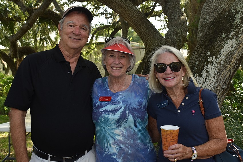 Ed Upshaw, Ginny Upshaw and Nancy Boyd catch up after dinner.