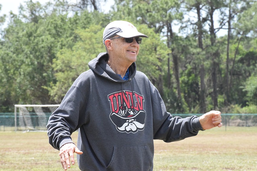 Sarasota's Phil Werdell smiles while dancing as Jah Movement performs.