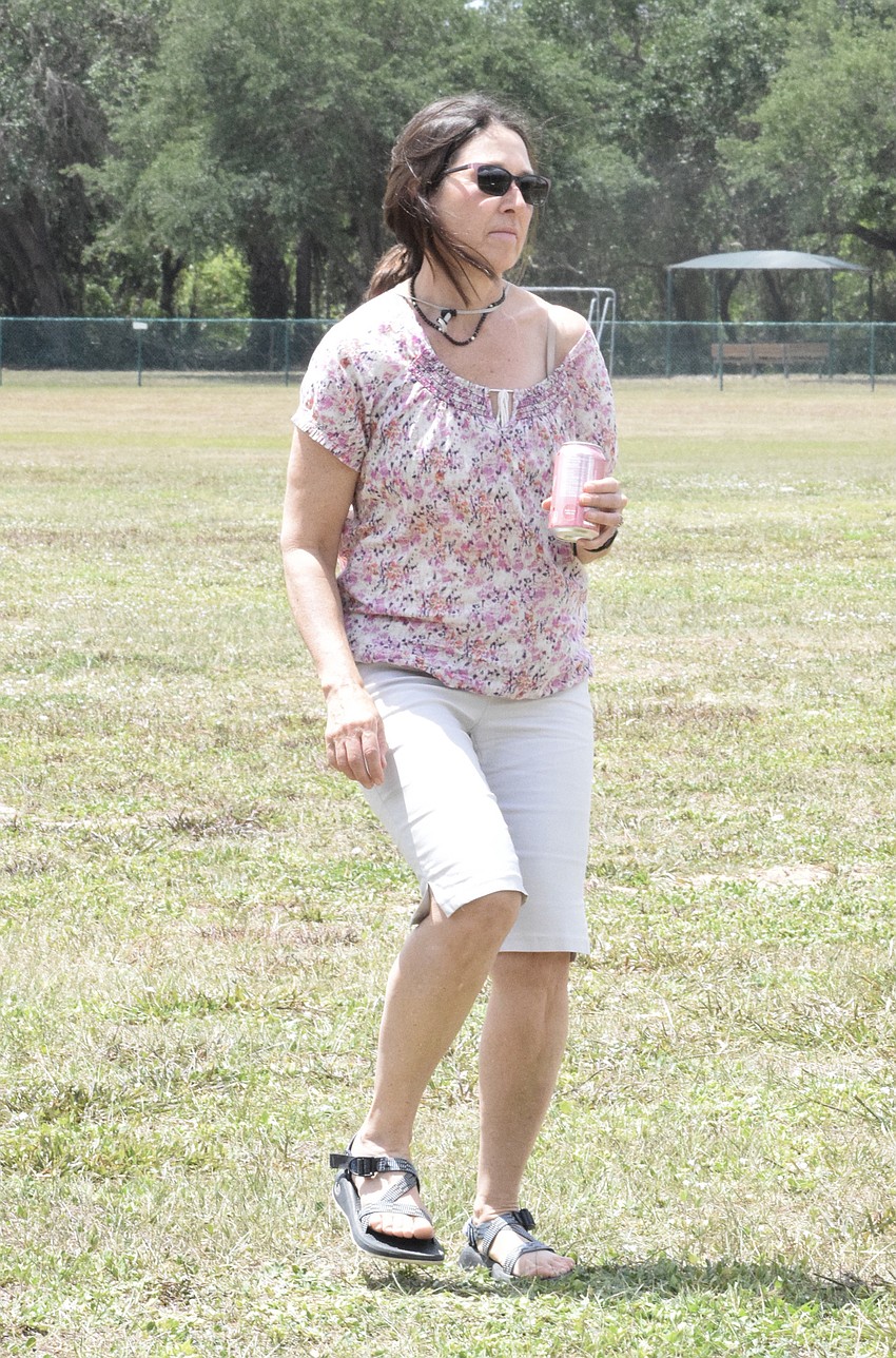 Sheila Freehill, who is visiting her stepdad Phil Werdell, of Sarasota, loves spending time with Werdell while dancing during the Concert in the Park.
