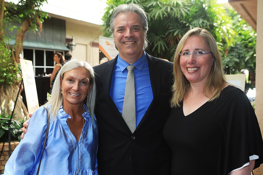 Mette Miland and Rob and Jennifer Rominiecki