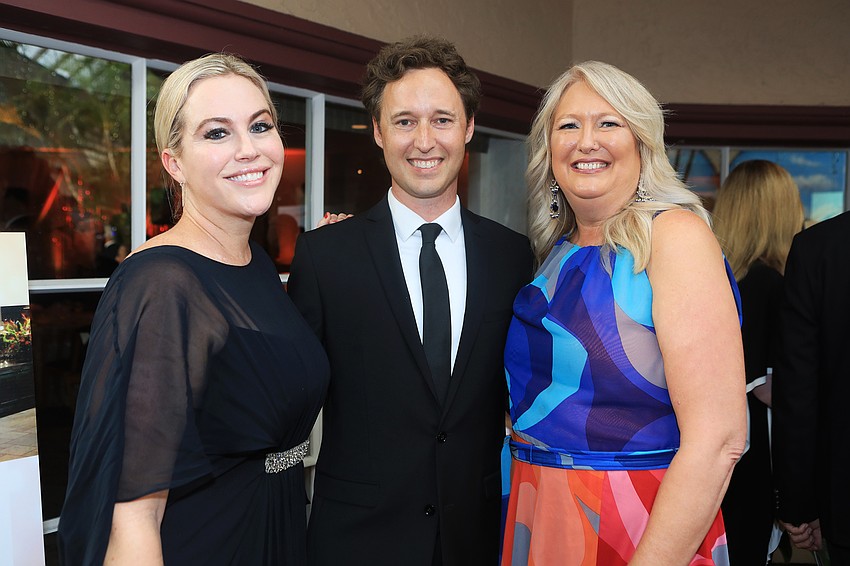 Nikki Taylor, board chair Brad Bryan and president Dr. Sara Grivetti