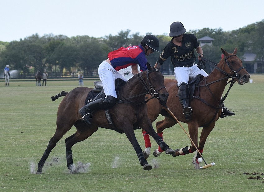 Regent's Felipe Viana fights for the ball with Hillcroft's Manuel Mazzocchi in front of the goal.