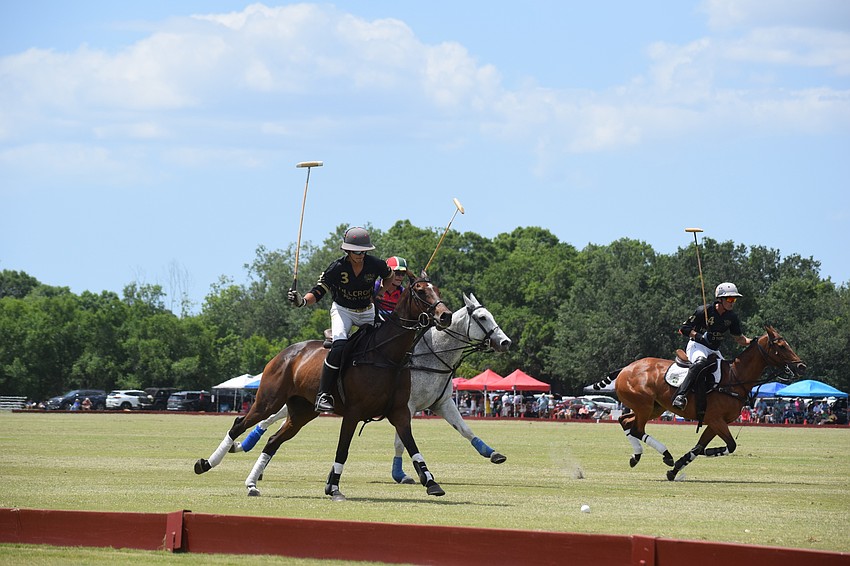 Hillcroft's Nachi Viana rises in the saddle to take a shot against Regent.