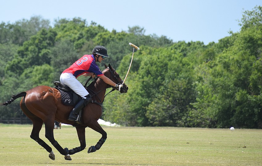 Regent's Felipe Viana breaks away from the field to score against Hillcrest.