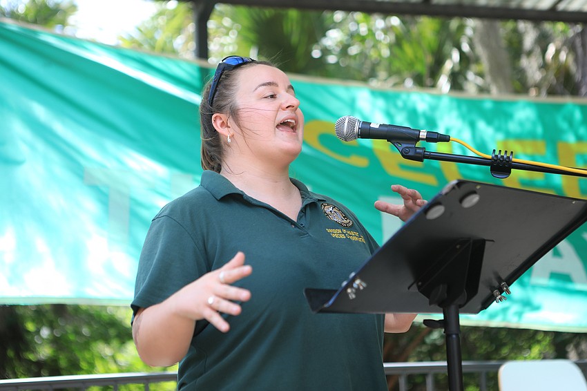 Florida Fish & Wildlife Conservation Commission specialist Taylor Apter speaks to the crowd.
