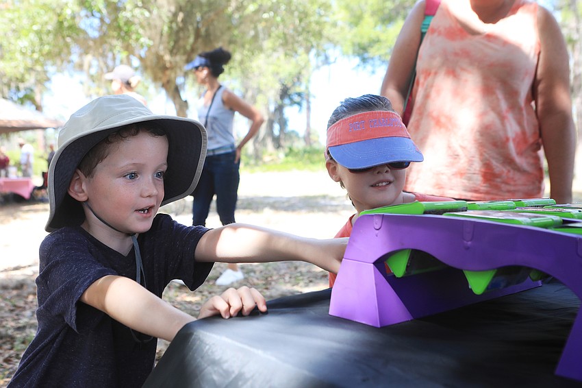 Jacob and Sarah Krizman learn more about Florida wildlife.