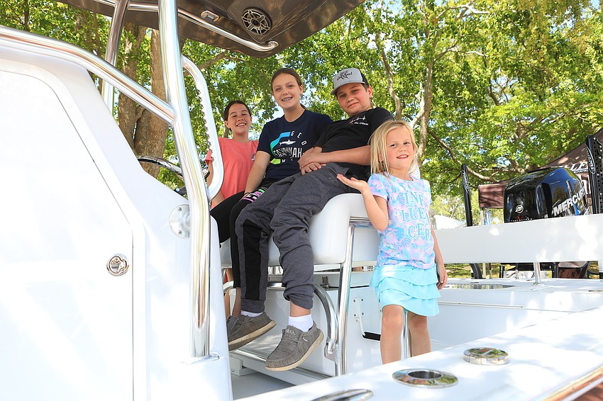 Raygan Galicia, Brooke Cason, Ty and Delaney Parker take some time on a boat.