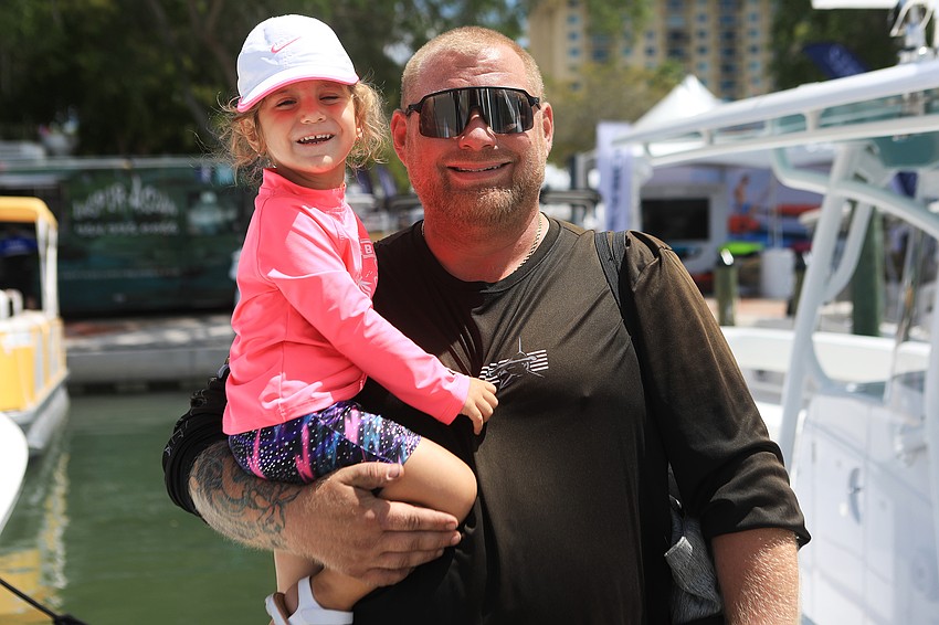 Francesca and Tommy Luciana admire the boats.