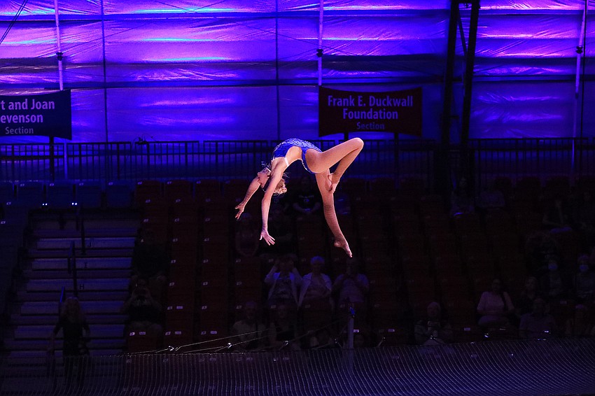 Addie van Wowern falls to the net below.