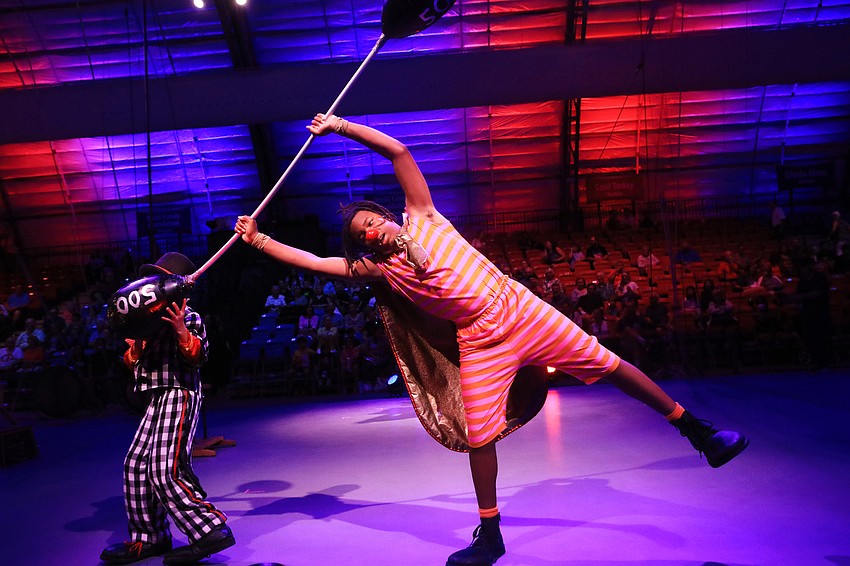 Elijah Clemons tips to the stage.