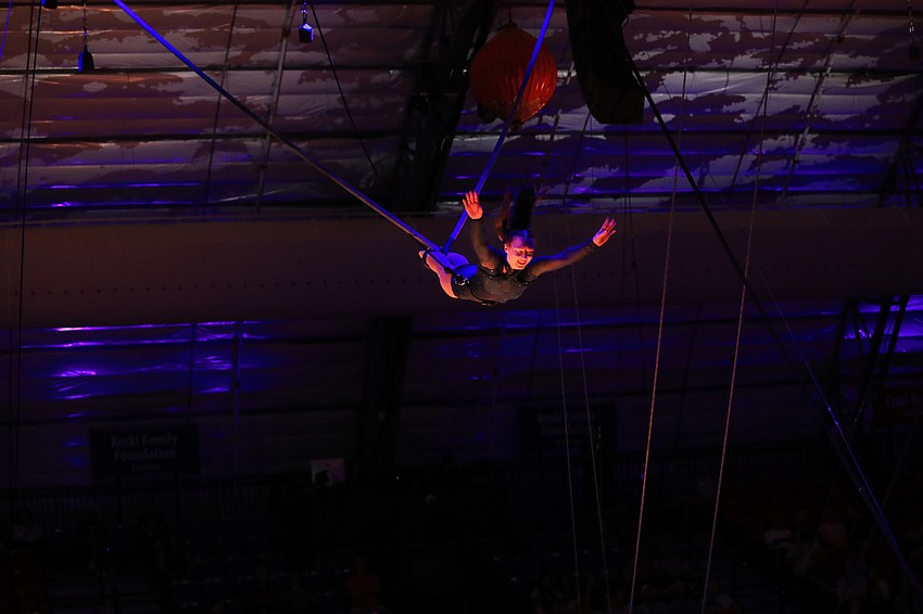 Cora Thayer performs tricks in the air.