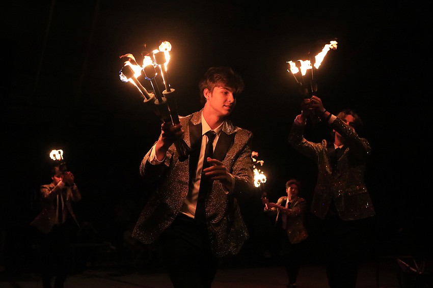 Aiden Bracewell finishes the fire juggling performance.