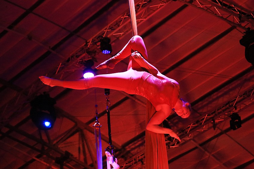 Iris Dahlborg hangs from silks