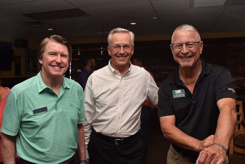 Earl Larson, Michael Vejins and Scott Kuykendall caught up.