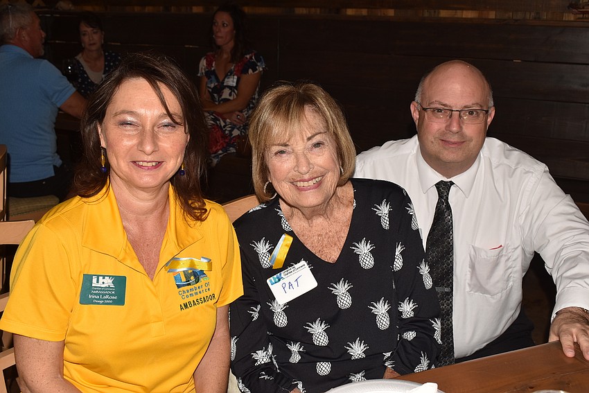Irina LaRose, Pam Mock and Brad Marner claimed a table to chat.