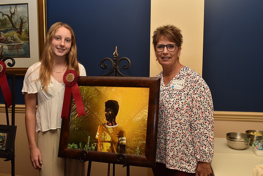 Art winner Ashlyn Kuiken and Sarasota High School teacher Debra Markley