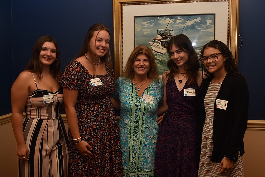 Letters chair Amy Elder, center, with winners Olivia Sahr, Anna Lazzara, Jade McCobb-Pratt and Jaysily Martinez-Rivera