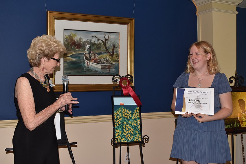 Polly Curran introduces Betty Altman Special Award winner Riley Karau.