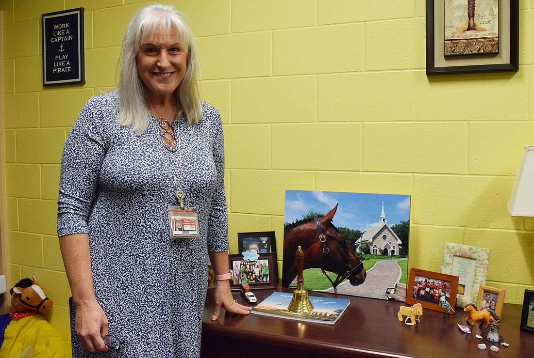 Connie Dixon plans to use her love of horses to connect with students when she becomes principal at Gene Witt Elementary School.