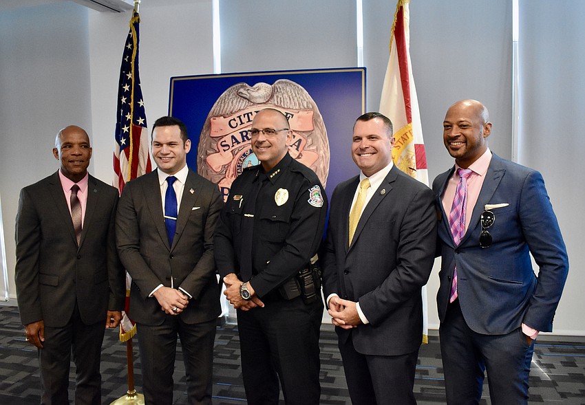 City Manager Marlon Brown, Mayor Erik Arroyo, Chief Rex Troche, Deputy City Manager Pat Robinson and Vice Mayor Kyle Battie pose for photos after the ceremony.