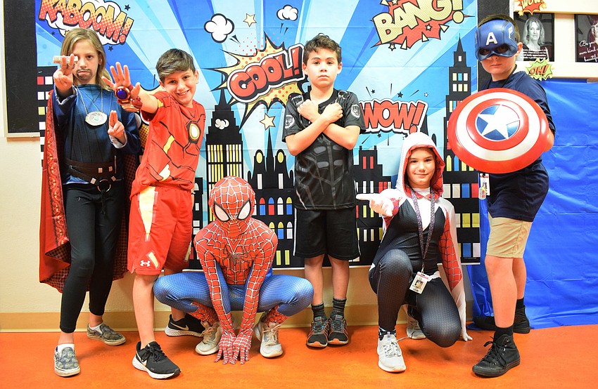 Fourth graders Kara Young, Dylanger Appel, Desmond Barfield, Adam Ramirez, Reese Middleton and Jaxson Hofius bring Marvel superheroes to life at Braden River Elementary School.