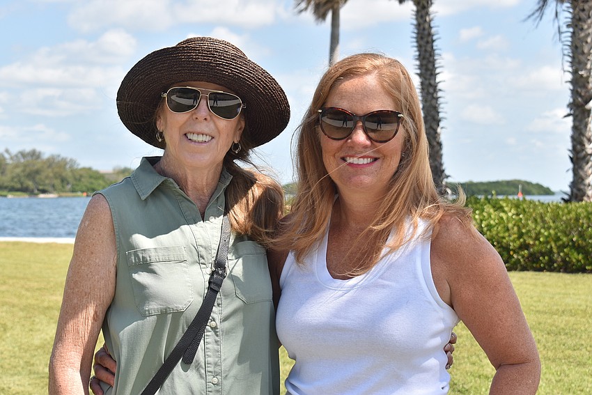 Lyn Haycock and Jen Shimek welcomed attendees to the picnic.